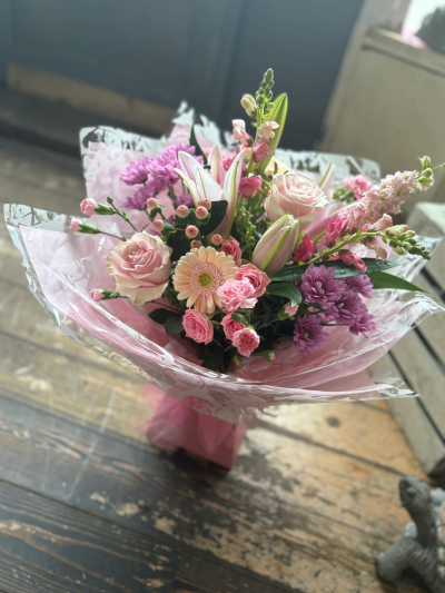 Pretty in Pink - Soft, elegant, and beautifully feminine, the Amelia Blush Bouquet is a charming arrangement designed in delicate shades of pink with touches of lavender and fresh greenery. Its graceful mix of textures and gentle pastel tones creates a romantic, uplifting display that feels both timeless and contemporary.

Presented in stylish pink wrapping and a coordinating gift box, this arrangement is perfect for birthdays, new baby celebrations, thank-you gifts, anniversaries, or simply letting someone know you're thinking of them. A thoughtful choice that brings warmth, beauty, and a touch of luxury to any occasion.