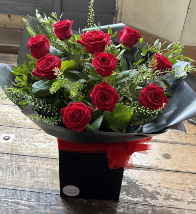 Large Headed Roses - Red - Beautiful red large headed roses with greenbells, fresh foliage and displayed in a presentation box. This product comes in water.