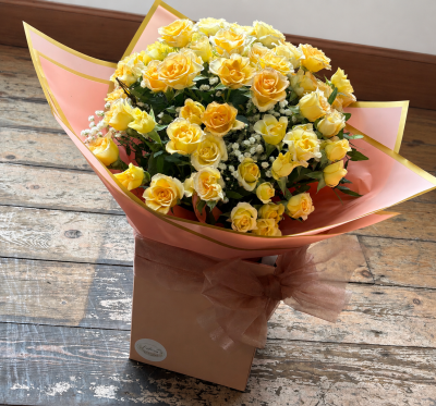 Spray Rose Hand Tied - Peach - Peach spray roses arranged with gypsophila and foliage. This product comes in water.