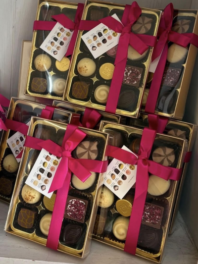 Luxury Chocolates - A box of 12 luxury chocolates nicely presented in a presentation box. A lovely and tasty add on to your order.